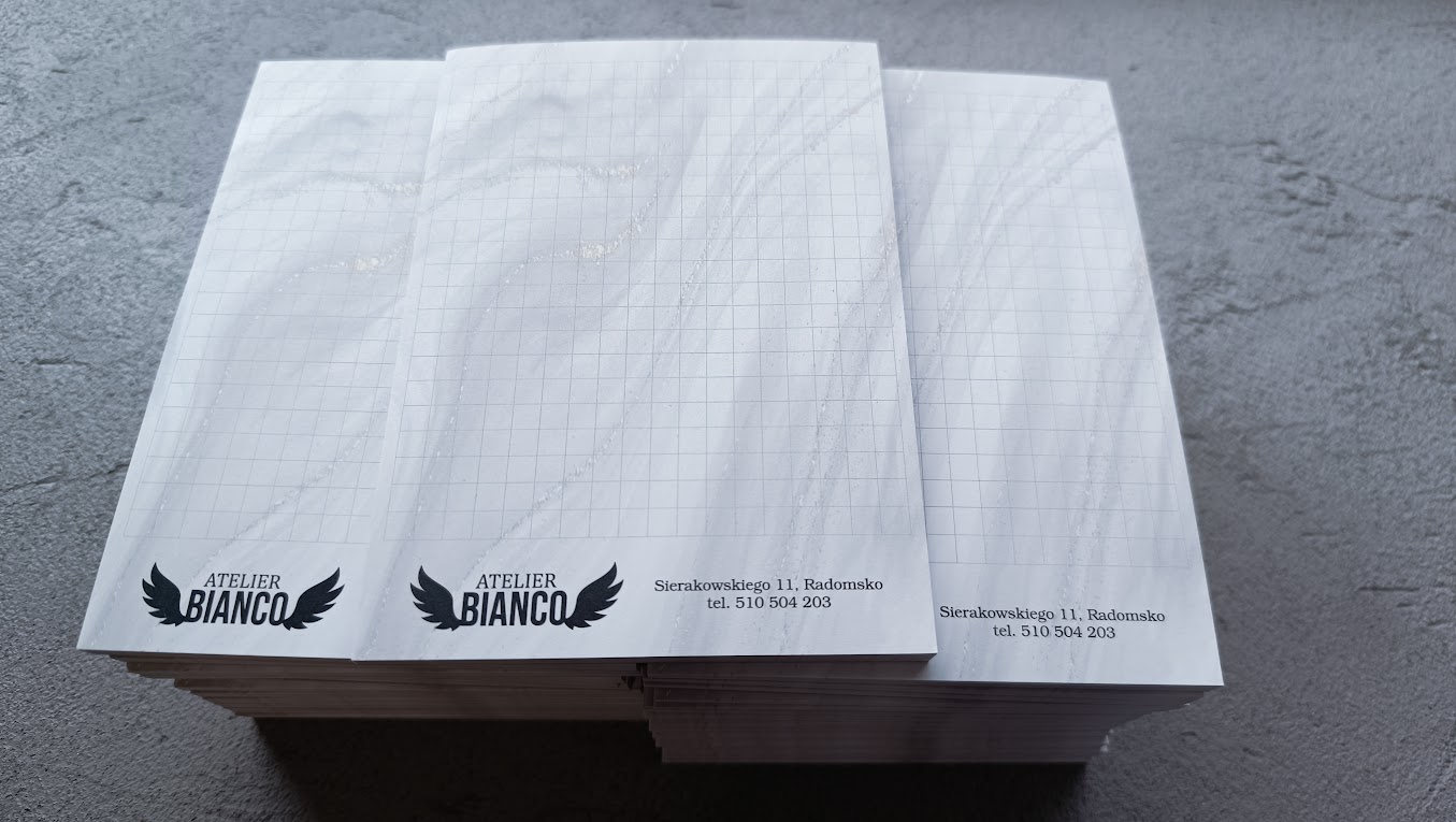 Personalizowane notesy firmowe Atelier Bianco wykonane przez Agencja Reklamy Gawlikowski w Radomsku.