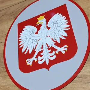 Owalna tablica urzędowa z godłem Polski z dibondu 50x40 cm dla Miejskiego Żłobka w Radomsku