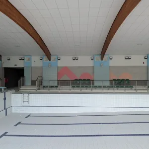 Dekoracje scienne z dibondu frezowane CNC na basenie Blekitna Fala Sandomierz dla firmy Inkomet